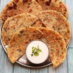A picture of Tapioca and Potato Stuffed Paratha - A Fasting Delight.