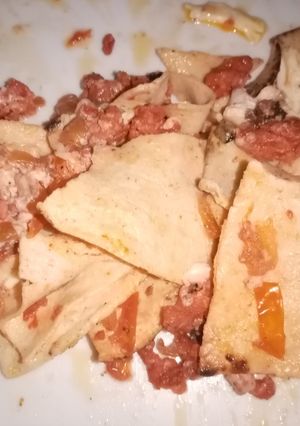 Una foto de Chilaquiles de chorizo