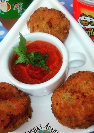 A picture of Minced meat in onion Ring.