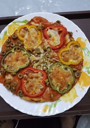صورة لوصفة بيتزا الحديقة