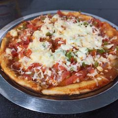 A picture of Wheat cheese pizza without yeast.