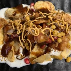 A picture of Idli and aloo chaat.