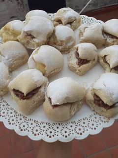 Una foto de Miguelitos de dulce de leche y pastelera