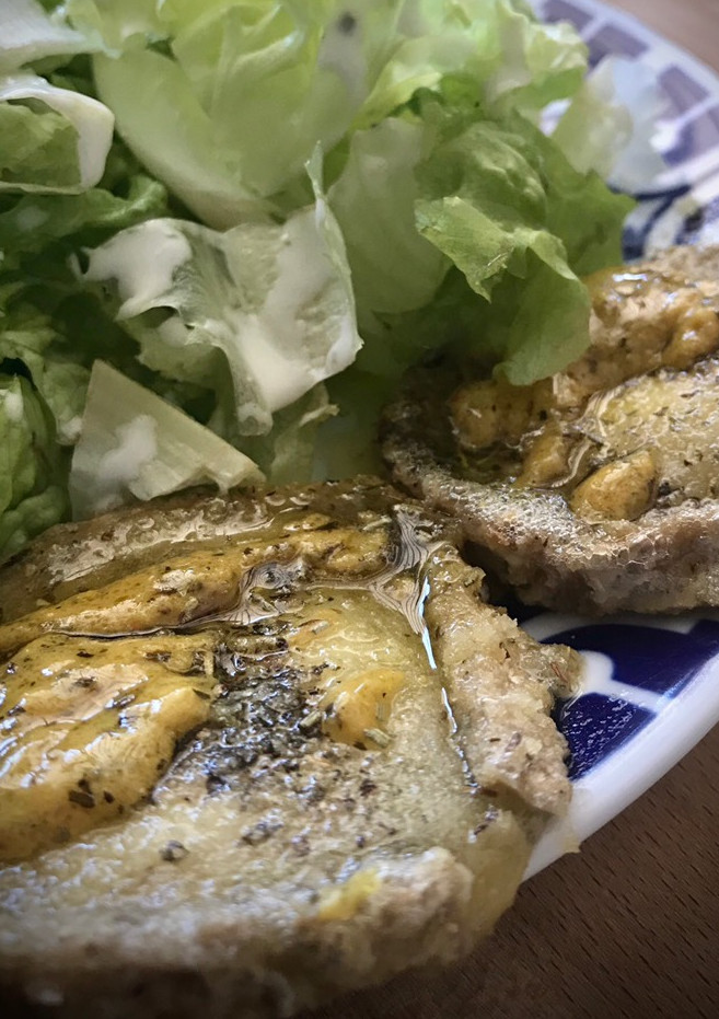 Una foto de Medallones especiados de queso de cabra al horno