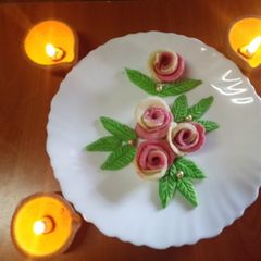 A picture of Diwali rose flower mithai (sweet) 🪔♥️🪔.