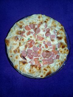 Una foto de Tarta salchitomate fácil y rica.😉