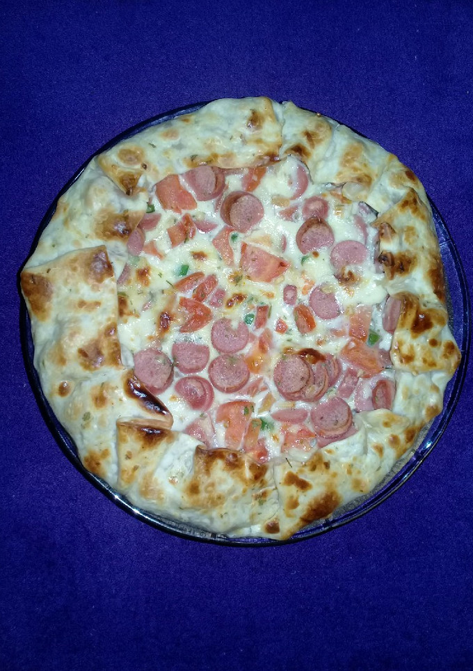 Una foto de Tarta salchitomate fácil y rica.😉