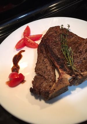 Una foto de T Bone Steak a la pimienta