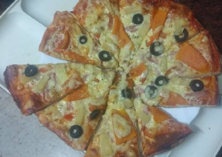 Pizza hawaiana con papaya y piña