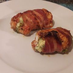 A picture of Stuffed Chicken breast wrapped in Bacon.