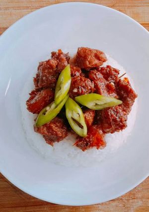 A picture of Gourmet Pork Binagoongan with Truffle Oil.