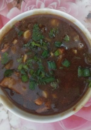 A picture of Mutton chilli with gravy.