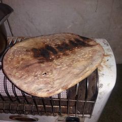 A picture of Naan on heater.