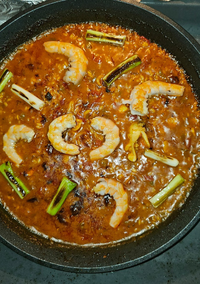 Una foto de Arroz seco con fumet tostado