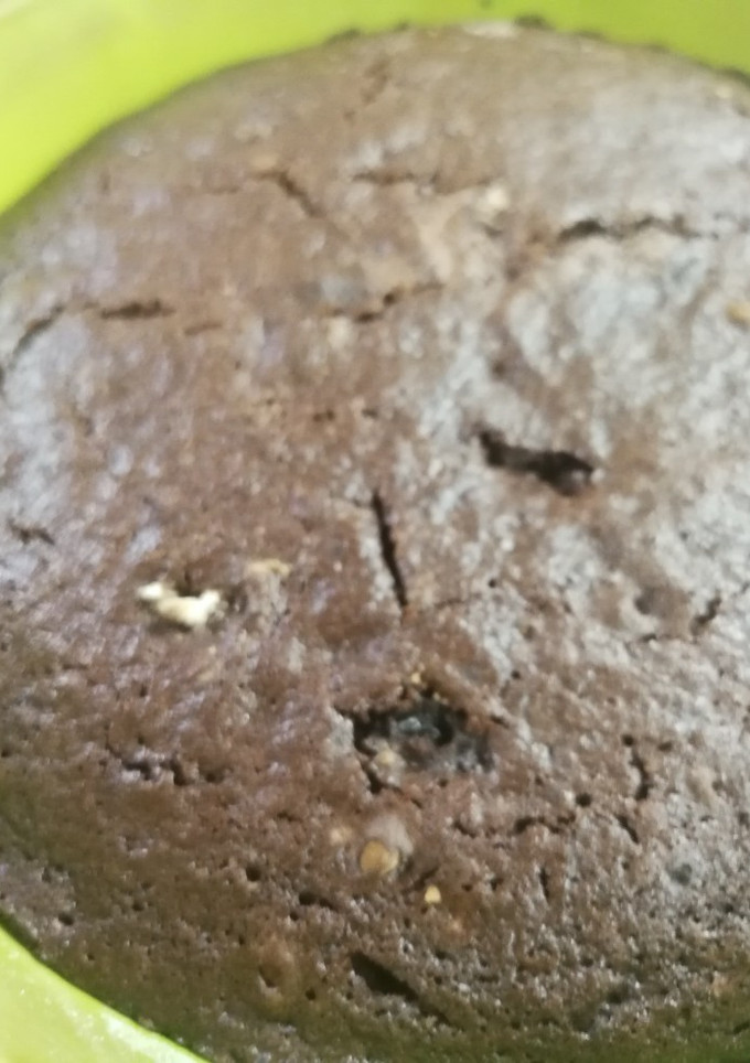 Una foto de Torta de chocolate bien húmeda y alta
