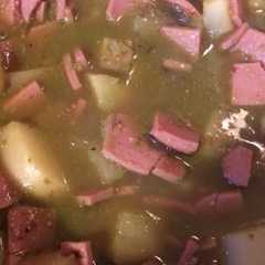 Una foto de Bologna con papas