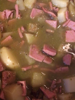 Una foto de Bologna con papas
