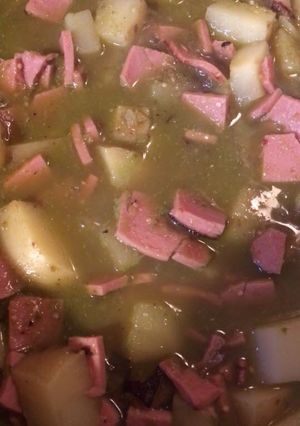 Una foto de Bologna con papas