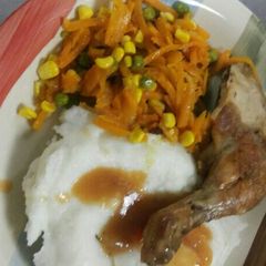 A picture of Chicken and mix salad.