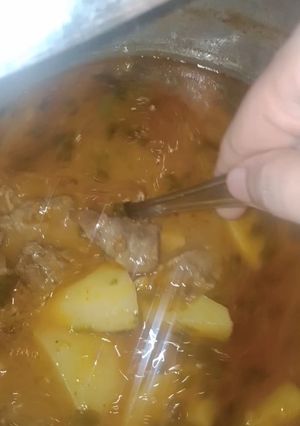 A picture of Aloo gosht.