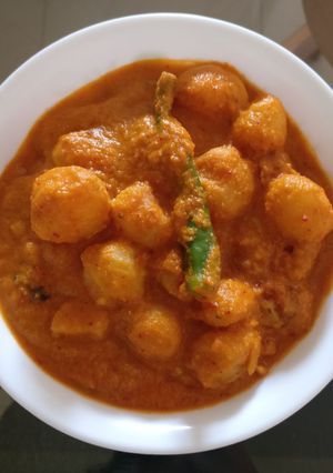 A picture of Dum Aloo (Baby Potatoes In Rich Gravy).