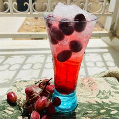 A picture of Fresh red grapes drink 🍷.