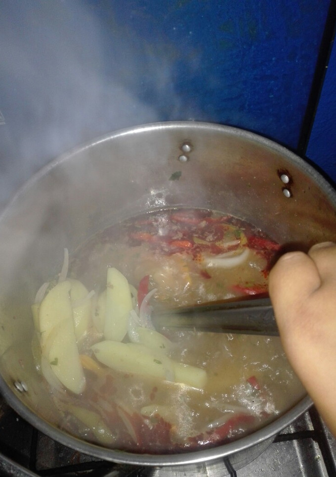 Una foto de Papas con tallarines