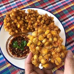 A picture of Sweet Corn Fritters with HomeMade Red Curry Paste Thai Style • Tod Mun Kao Paok |ThaiChef Food.