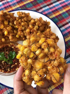 A picture of Sweet Corn Fritters with HomeMade Red Curry Paste Thai Style • Tod Mun Kao Paok |ThaiChef Food.