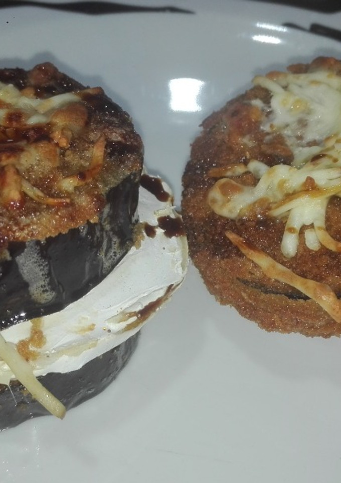Una foto de Berenjenas con queso