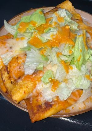 Una foto de Enchiladas rojas