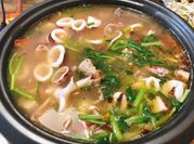 A picture of lẩu mực tươi