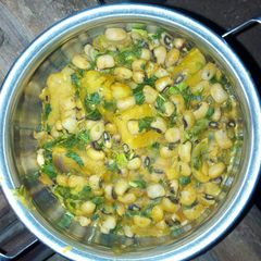 A picture of Porridge yam and beans and spinach.