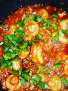 A picture of Mushrooms, Prawns and Mashed Red Snapper in tomatoe Sauce.
