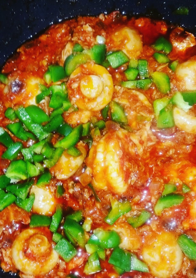 A picture of Mushrooms, Prawns and Mashed Red Snapper in tomatoe Sauce.
