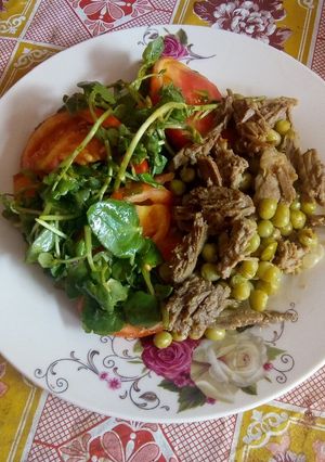 Una foto de Carne mechada con arvejas