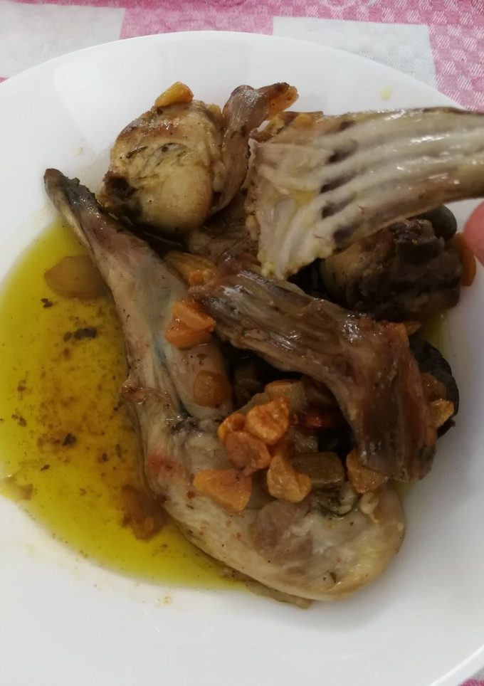 Una foto de Conejo al ajillo