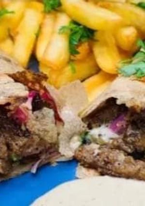 A picture of Syrian Chicken Shawarma Sandwiches.