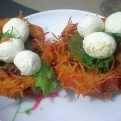 A picture of Aloo paneer bird nest.