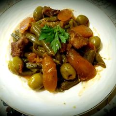 Tajine with beans, green olives A picture of Tajine with beans, green olives.