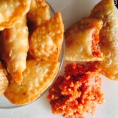 A picture of Carrot Halwa stuffed Gujiya.