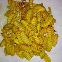 A picture of Potato wedges.