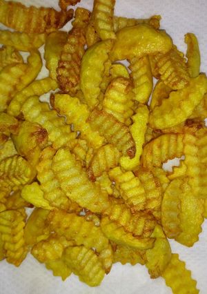 A picture of Potato wedges.