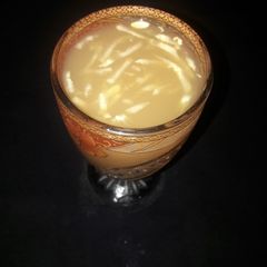 A picture of Tamarind juice with cucumber.