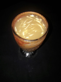A picture of Tamarind juice with cucumber.
