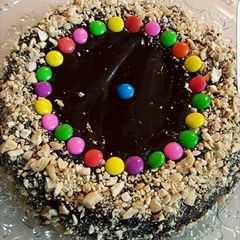 A picture of Chocolate cake with ganache.