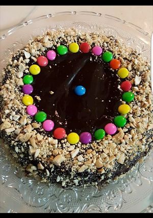 A picture of Chocolate cake with ganache.
