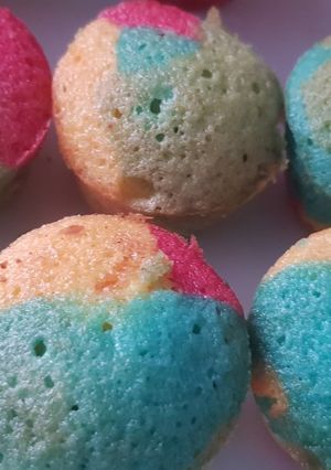 A picture of Mini rainbow fairycakes.