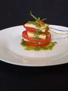 Una foto de Tomates a la capressa