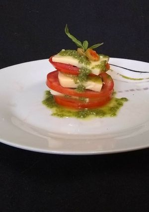 Una foto de Tomates a la capressa